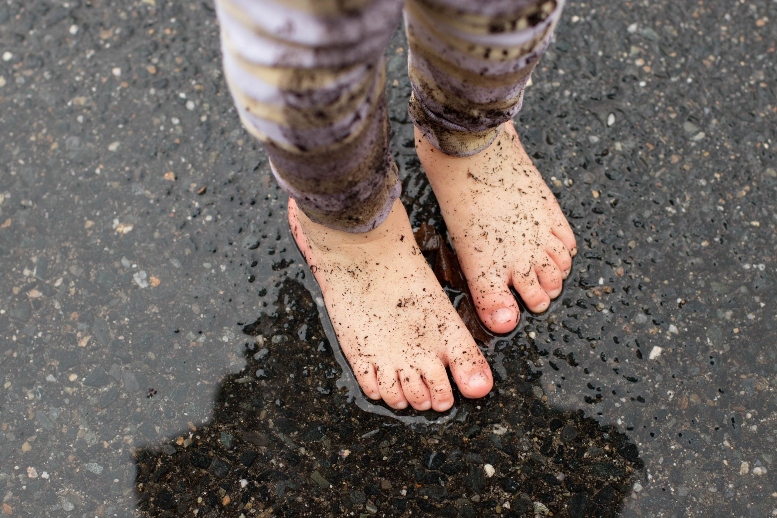 lover la earth day in the rain muddy bare feet